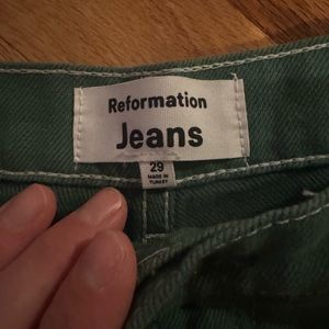 Kelley Green cowboy cut Reformation jeans. Excellent condition.
